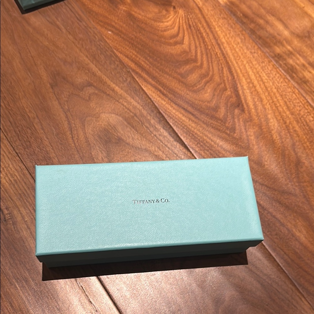 Authentic Tiffany box.